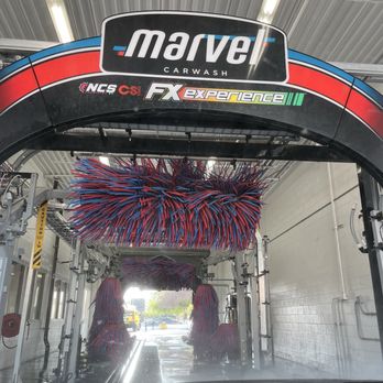 Express car wash tunnel at a Marvel Car Wash location